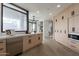 Kitchen featuring modern appliances, a marble backsplash, and ample cabinetry at 39493 N 107Th Way, Scottsdale, AZ 85262