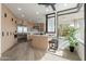 Modern kitchen with stainless steel appliances, center island, and a breakfast bar at 39493 N 107Th Way, Scottsdale, AZ 85262