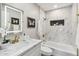 Elegant bathroom with marble and gold fixtures at 4726 E Grandview Rd, Phoenix, AZ 85032