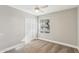 Cozy bedroom with a double door closet and ceiling fan at 4726 E Grandview Rd, Phoenix, AZ 85032