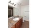 Clean bathroom with double vanity, shower, and toilet at 5122 E Shea Blvd # 1005, Scottsdale, AZ 85254