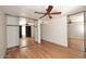 Bright bedroom with ceiling fan, mirrored closet, and wood floors at 5122 E Shea Blvd # 1005, Scottsdale, AZ 85254