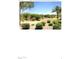 Landscaped grounds with walking path and trees at 5122 E Shea Blvd # 1005, Scottsdale, AZ 85254