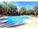 Inviting community pool with lounge chairs and shade at 5122 E Shea Blvd # 1005, Scottsdale, AZ 85254