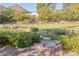 Backyard with a putting green, rock features, and beautiful landscaping at 5203 N Monte Vista Dr, Paradise Valley, AZ 85253