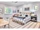 Comfortable bedroom with a black-and-white theme, offering natural light and a cozy ambiance at 5203 N Monte Vista Dr, Paradise Valley, AZ 85253