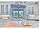 Bright kitchen features white cabinets, marble counters, and a window with a mountain view at 5203 N Monte Vista Dr, Paradise Valley, AZ 85253