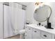 Modern bathroom with a white vanity and a white shower curtain at 5748 W Soft Wind Dr, Glendale, AZ 85310