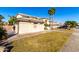 House exterior showcasing a side view and landscaping at 5748 W Soft Wind Dr, Glendale, AZ 85310