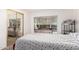 Bedroom with a double bed and mirrored closet doors at 6960 W Peoria Ave # 171, Peoria, AZ 85345