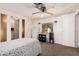 Charming bedroom with a ceiling fan and plenty of closet space at 6960 W Peoria Ave # 171, Peoria, AZ 85345