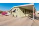 Mobile home with carport and walkway at 6960 W Peoria Ave # 171, Peoria, AZ 85345