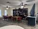 Community library featuring comfortable seating, bookshelves, and a TV at 6960 W Peoria Ave # 171, Peoria, AZ 85345