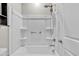 Clean bathroom with a shower/tub combo and built-in shelving at 755 E Zion Dr # 103, Gilbert, AZ 85297