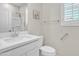 Bathroom with white vanity, toilet and shower/tub combo at 755 E Zion Dr # 103, Gilbert, AZ 85297