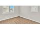 Empty bedroom with wood-look floors and window with shutters at 755 E Zion Dr # 103, Gilbert, AZ 85297