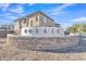 Community entrance with a stone wall and Mosaic lettering at 755 E Zion Dr # 103, Gilbert, AZ 85297