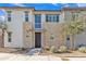 Two-story home with stone accents and a modern front door at 755 E Zion Dr # 103, Gilbert, AZ 85297