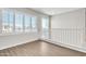 Bright loft area with window and white railing at 755 E Zion Dr # 103, Gilbert, AZ 85297