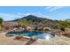 Luxury backyard oasis featuring a sparkling pool, spa, and mountain views at 7575 E Camino Salida Del Sol --, Scottsdale, AZ 85266