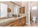 Elegant bathroom with double vanity and large mirror at 7575 E Camino Salida Del Sol --, Scottsdale, AZ 85266