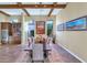 Elegant dining room features a large table and wood beams at 7575 E Camino Salida Del Sol --, Scottsdale, AZ 85266