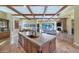 Open kitchen with large island that overlooks the living room at 7575 E Camino Salida Del Sol --, Scottsdale, AZ 85266