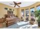 Large main bedroom with hardwood floors and ample natural light at 7575 E Camino Salida Del Sol --, Scottsdale, AZ 85266