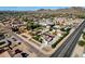 Aerial view showing a house's location on a corner lot with a pool and a main road nearby at 8308 W Avenida Del Sol --, Peoria, AZ 85383