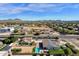 An aerial view showing a house with a pool and a spacious backyard, located near a main road at 8308 W Avenida Del Sol --, Peoria, AZ 85383