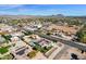 An aerial view of a house with a pool, solar panels, and a large lot, situated near a main road at 8308 W Avenida Del Sol --, Peoria, AZ 85383