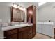 Bathroom features a vanity, shower, and laundry hookups at 8308 W Avenida Del Sol --, Peoria, AZ 85383