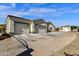 Three-car garage with large driveway and additional building at 8308 W Avenida Del Sol --, Peoria, AZ 85383