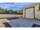 Detached garage with roll-up door and covered parking area at 8308 W Avenida Del Sol --, Peoria, AZ 85383