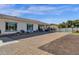 House exterior with brick paved driveway and pool in background at 8308 W Avenida Del Sol --, Peoria, AZ 85383