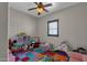 Playroom with colorful playmat, toys and a slide at 8308 W Avenida Del Sol --, Peoria, AZ 85383