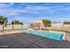 Inviting pool with waterfall feature and ample deck space at 8308 W Avenida Del Sol --, Peoria, AZ 85383