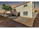 Spacious backyard with a concrete patio and gravel landscaping at 8851 E Pampa Ave, Mesa, AZ 85212