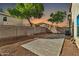 Backyard with concrete patio and gravel at sunset at 8851 E Pampa Ave, Mesa, AZ 85212