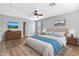 Main bedroom with dresser and ceiling fan at 8851 E Pampa Ave, Mesa, AZ 85212