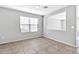 Dining area with tile floors and a view to the living room at 8851 E Pampa Ave, Mesa, AZ 85212