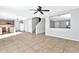 Living room with tile floors and ceiling fan at 8851 E Pampa Ave, Mesa, AZ 85212