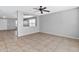 Bright living room with tile floors and high ceilings at 8851 E Pampa Ave, Mesa, AZ 85212