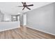 Upstairs hallway with laminate floors and ceiling fan at 8851 E Pampa Ave, Mesa, AZ 85212