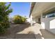 Spacious backyard with covered patio and fruit trees at 9323 E Arrowvale Dr, Sun Lakes, AZ 85248