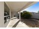 Covered patio, view of backyard and fruit trees at 9323 E Arrowvale Dr, Sun Lakes, AZ 85248