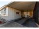 Covered carport with storage and American flag at 9501 E Broadway Rd # 178, Mesa, AZ 85208