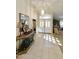 Elegant entryway with tile flooring and a console table at 9509 E Arrowvale Dr, Sun Lakes, AZ 85248