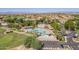 Aerial view of community pool and surrounding landscape at 9509 E Arrowvale Dr, Sun Lakes, AZ 85248