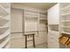 Large walk-in closet with ample shelving and hanging space at 9509 E Arrowvale Dr, Sun Lakes, AZ 85248